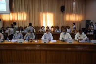 Representatives of various political parties attend a meeting organized by the Union Election Commission Friday, May 21, 2021 in Naypyitaw, Myanmar. The head of Myanmar's military-appointed state election commission says his agency will consider dissolving Aung San Suu Kyi's former ruling party for its alleged involvement in electoral fraud and have its leaders charged with treason. (AP Photo)