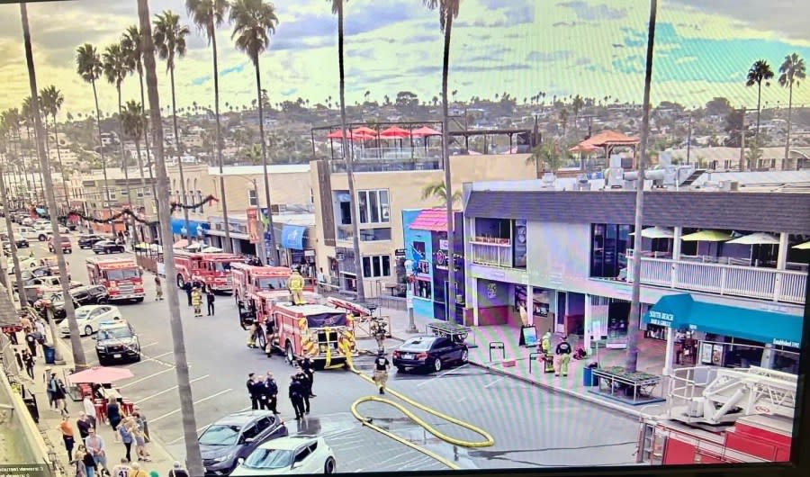 View from a nearby web camera of fire crews responding to the Lighthouse Ice Cream shop in Ocean Beach on Nov. 24, 2023. (Courtesy of Carol Ladiges)