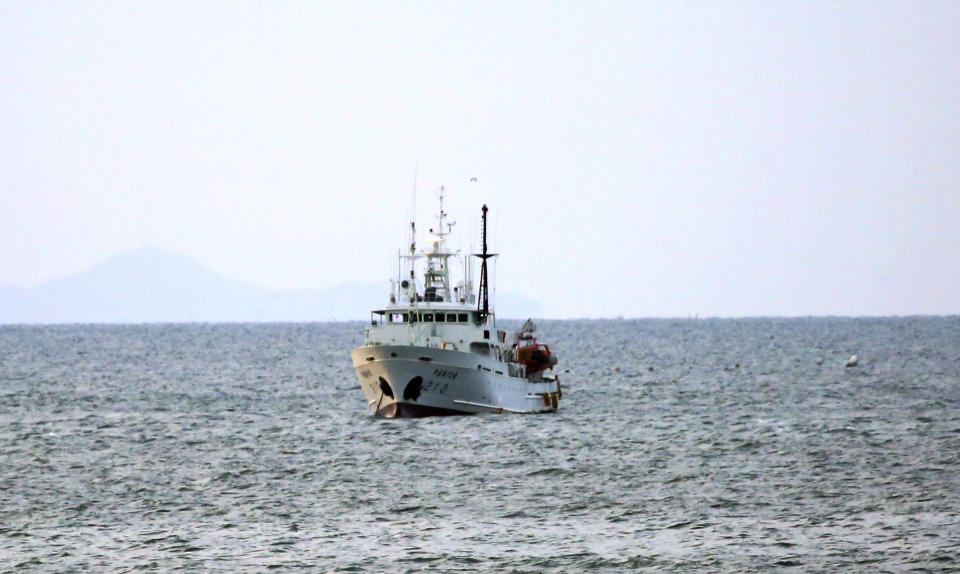 South Korea's government ship for a fishery guidance is seen near Yeonpyeong island, South Korea, Saturday, Sept. 26, 2020. South Korea said Saturday it will request North Korea to further investigate the killing of a South Korean government official who was shot by North Korean troops after being found adrift near the rivals' disputed sea boundary while apparently trying to defect. (Baek Seung-ryul/Yonhap via AP)
