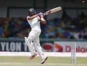 India's Rohit Sharma plays a shot during the second day of their third and final test cricket match against Sri Lanka in Colombo , August 29, 2015. REUTERS/Dinuka Liyanawatte