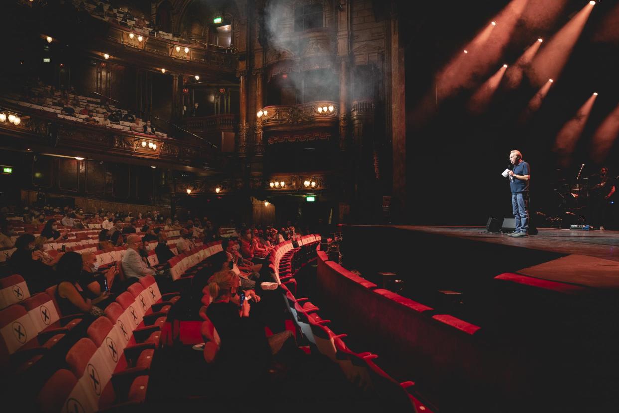 Andrew Lloyd Webber speaks to the audience at the London Palladium during a pilot for new safety measures at London theatres: Andy Paradise