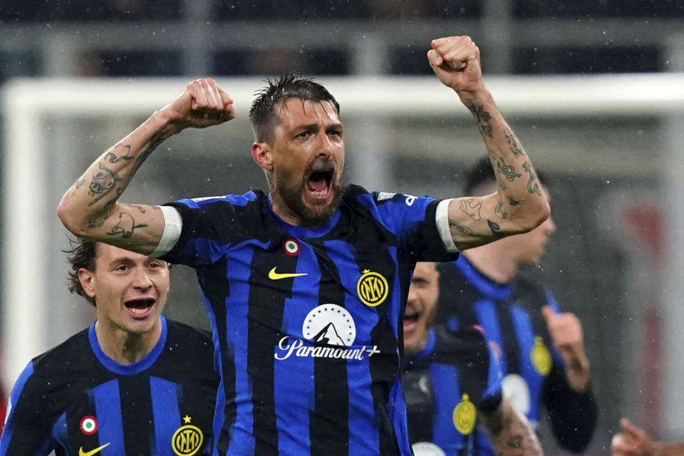 Inter's Francesco Acerbi celebrates after scoring during the Serie A soccer match between AC Milan and Inter Milan at San Siro stadium, in Milan, Italy, Monday, April 22, 2024. (Spada/LaPresse via AP)