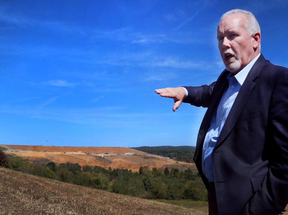 Rutherford County Mayor Joe Carr talks about the Middle Point Landfill that can be seen behind him on Wednesday, Oct. 5, 2022.