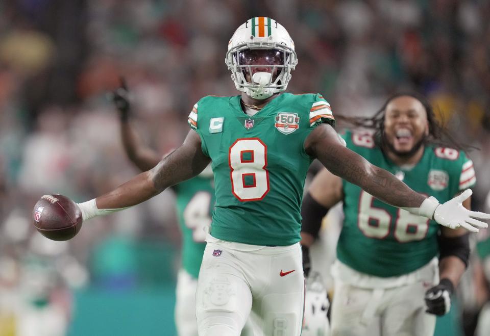 Miami Dolphins safety Jevon Holland (8) celebrates an interception late in the game against the Pittsburgh Steelers at Hard Rock Stadium in Miami Gardens, Oct. 23, 2022. 