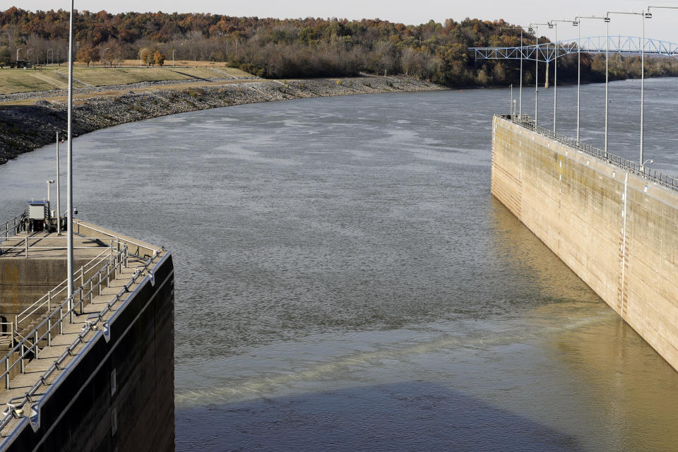 A line of bubbles from a bio-acoustic fish fence rises to the surface of the water at Barkley Lock and Dam where the Cumberland River meets Lake Barkley, Friday, Nov. 8, 2019, in Grand Rivers, Ky. The noise-making, bubbling, bio-acoustic barrier has been installed in the lock to deter the spread of destructive Asian carp . (AP Photo/Mark Humphrey)