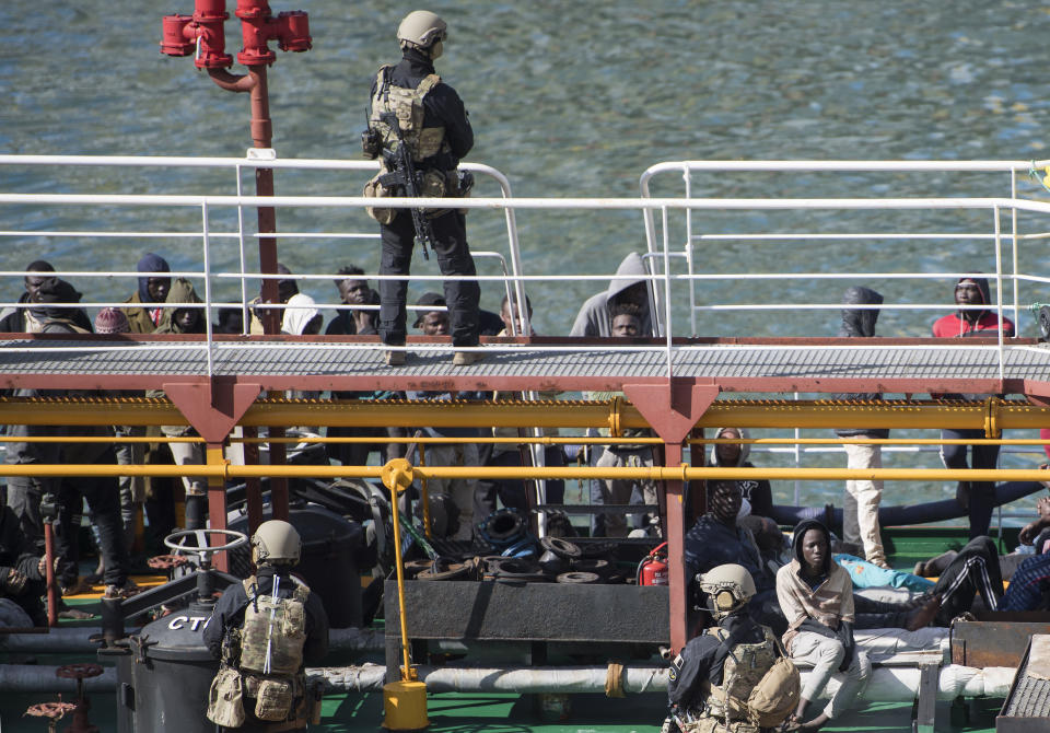 Armed forces stand onboard the Turkish oil tanker El Hiblu 1, which was hijacked by migrants, in Valletta, Malta, Thursday March 28, 2019. A Maltese special operations team on Thursday boarded a tanker that had been hijacked by migrants rescued at sea, and returned control to the captain, before escorting it to a Maltese port. (AP Photo/Rene' Rossignaud)