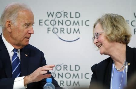 U.S. Vice President Joe Biden (L) talks with Elizabeth Blackburn, President of The Salk Institute for Biological Studies during the session "Cancer Moonshot: A Call to Action" during the annual meeting of the World Economic Forum (WEF) in Davos, Switzerland January 19, 2016. REUTERS/Ruben Sprich