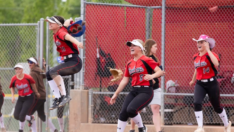 The Grantsville Cowboys celebrate after winning the 3A softball semifinals against the Emery Spartans at Spanish Fork Sports Park in Spanish Fork on Friday, May 10, 2024.