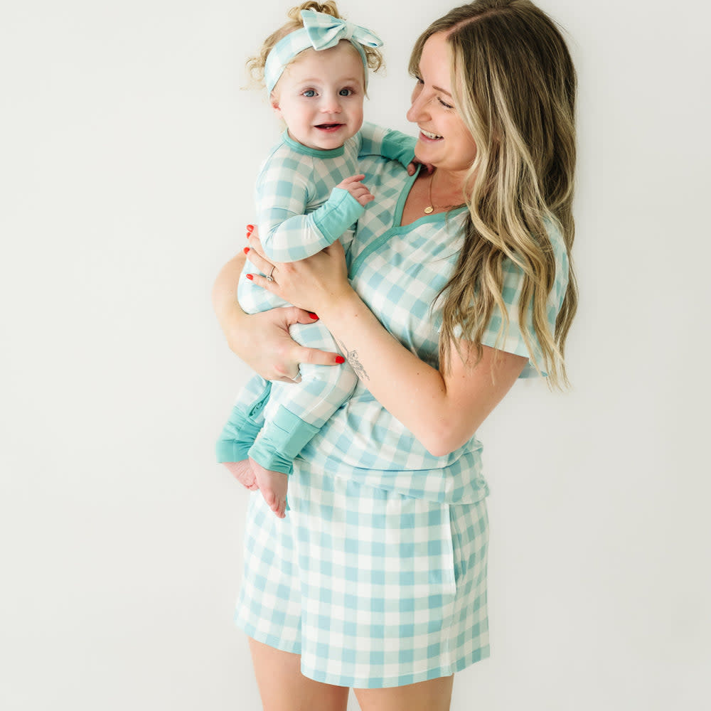 <p><a href="https://go.redirectingat.com?id=74968X1596630&url=https%3A%2F%2Flittlesleepies.com%2Fproducts%2Faqua-gingham-womens-pajama-shorts&sref=https%3A%2F%2Fwww.thepioneerwoman.com%2Fholidays-celebrations%2Fg35421414%2Ffamily-easter-pajamas%2F" rel="nofollow noopener" target="_blank" data-ylk="slk:Shop Now;elm:context_link;itc:0;sec:content-canvas" class="link rapid-noclick-resp">Shop Now</a></p><p>Bamboo Gingham Pajamas</p><p>littlesleepies.com</p><p>$28.00</p><span class="copyright">Little Sleepies</span>