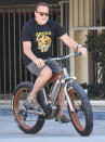 <p>Arnold Schwarzenegger wears a self-referential shirt for a Wednesday bike ride in Los Angeles. </p>