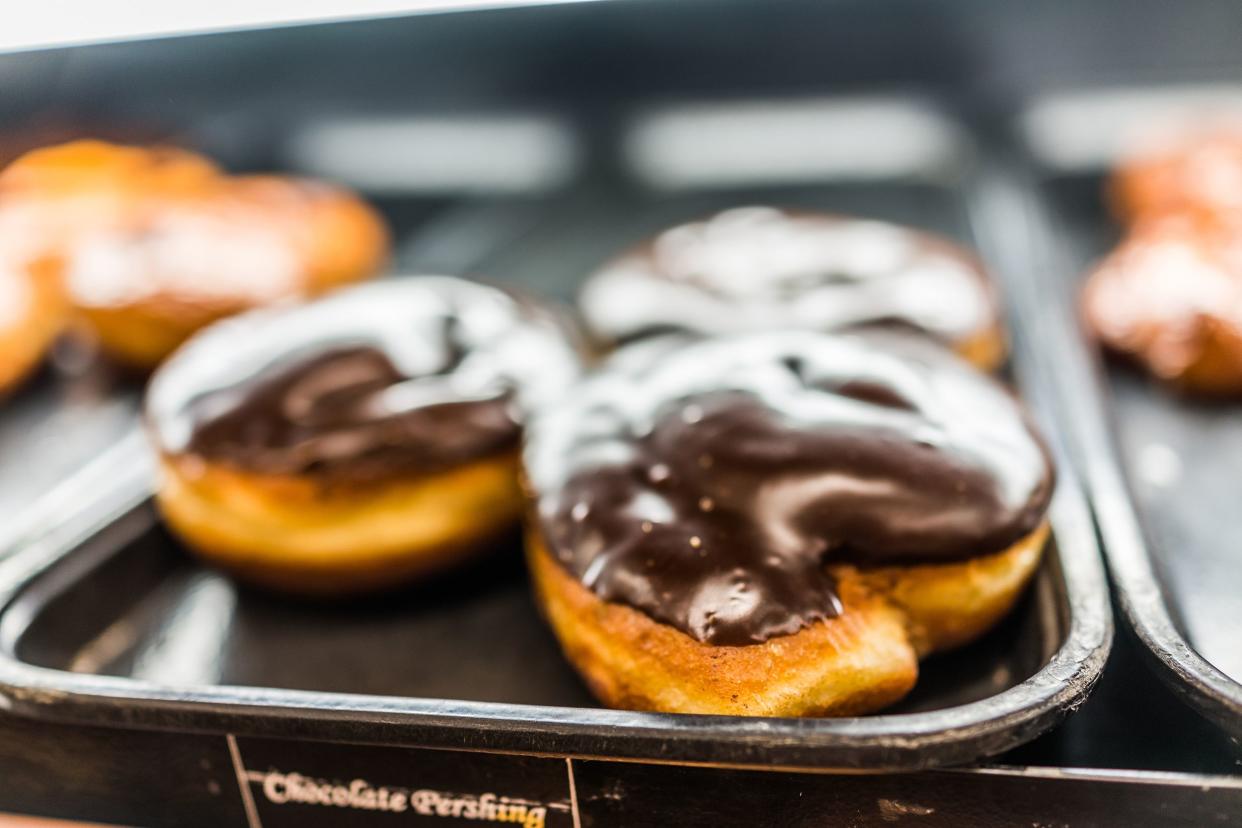 chocolate pershing icing covered boston cream donut