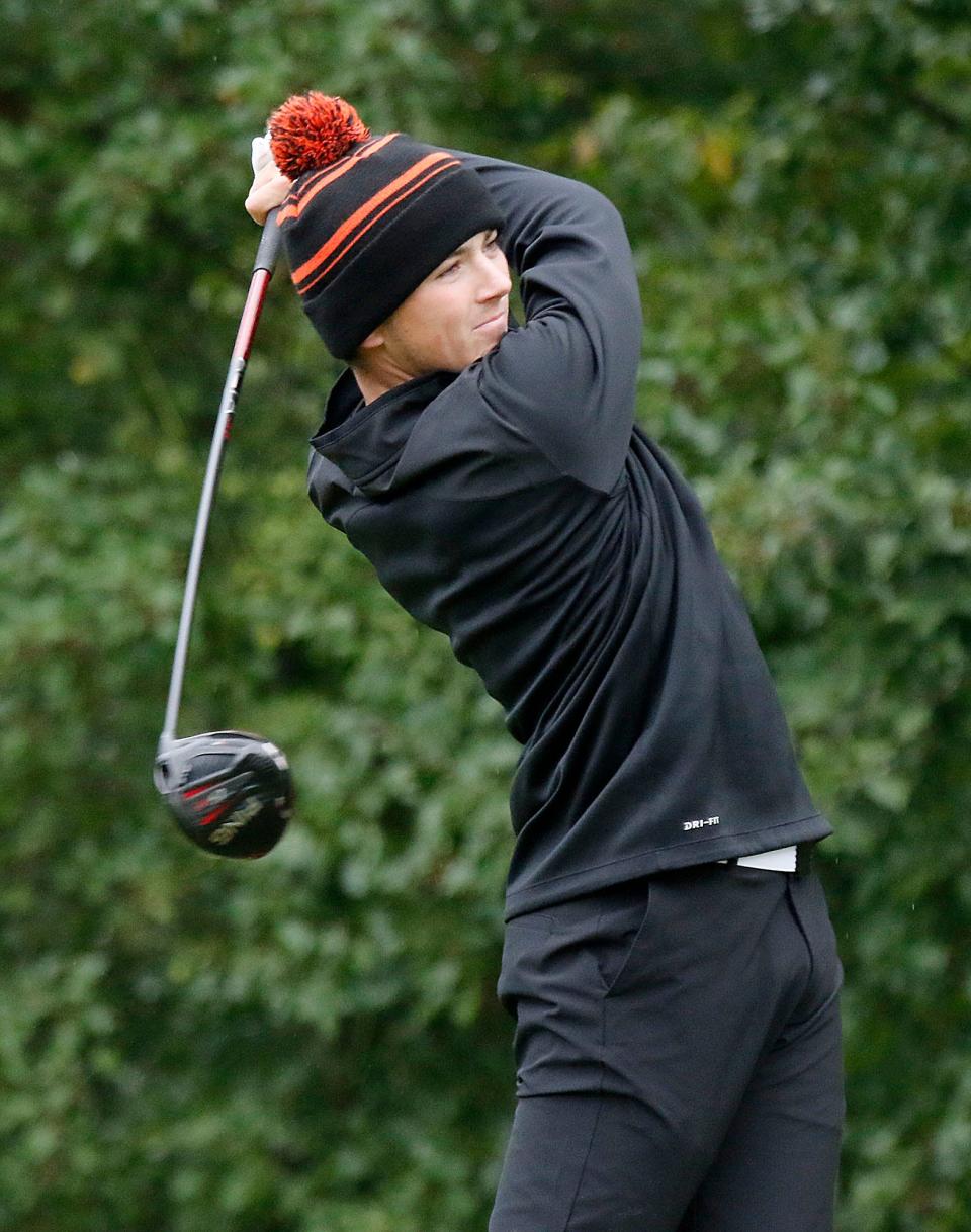 Ashland High School's Kamden Mowry tees off during the OCC golf championships Thursday, Sept. 22, 2021 at Mohican Hills Golf Course. TOM E. PUSKAR/TIMES-GAZETTE.COM