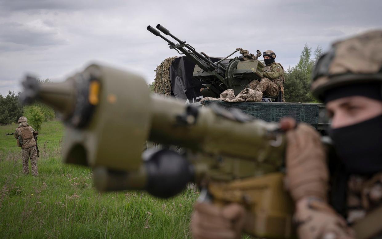 Members of a Ukrainian air-defense unit demonstrate their work near Kyiv on Monday, May 8, 2023 - Andrew Kravchenko/AP