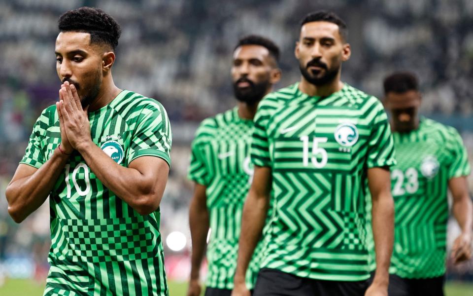 Players of Saudi Arabia warm up ahead of the Qatar 2022 World Cup Group C football match between Saudi Arabia and Mexico at the Lusail Stadium in Lusail, north of Doha on November 30, 2022 - Khaled Desouki/Getty Images