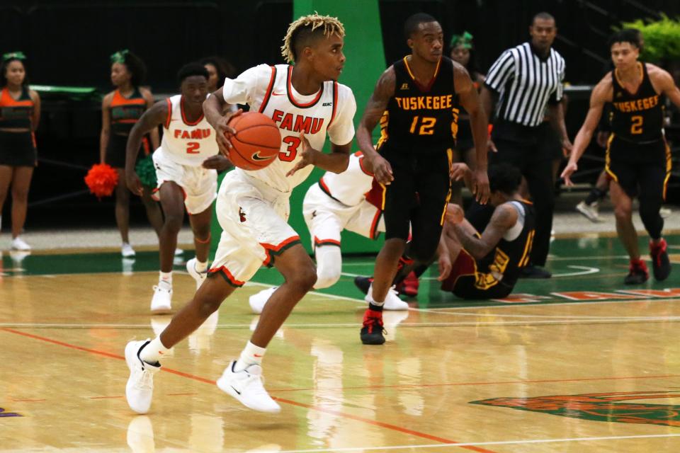 Florida A&M guard M.J. Randolph takes the rebound and drives versus Tuskegeei n the first home game of the season on Saturday, Nov. 10, 2018.