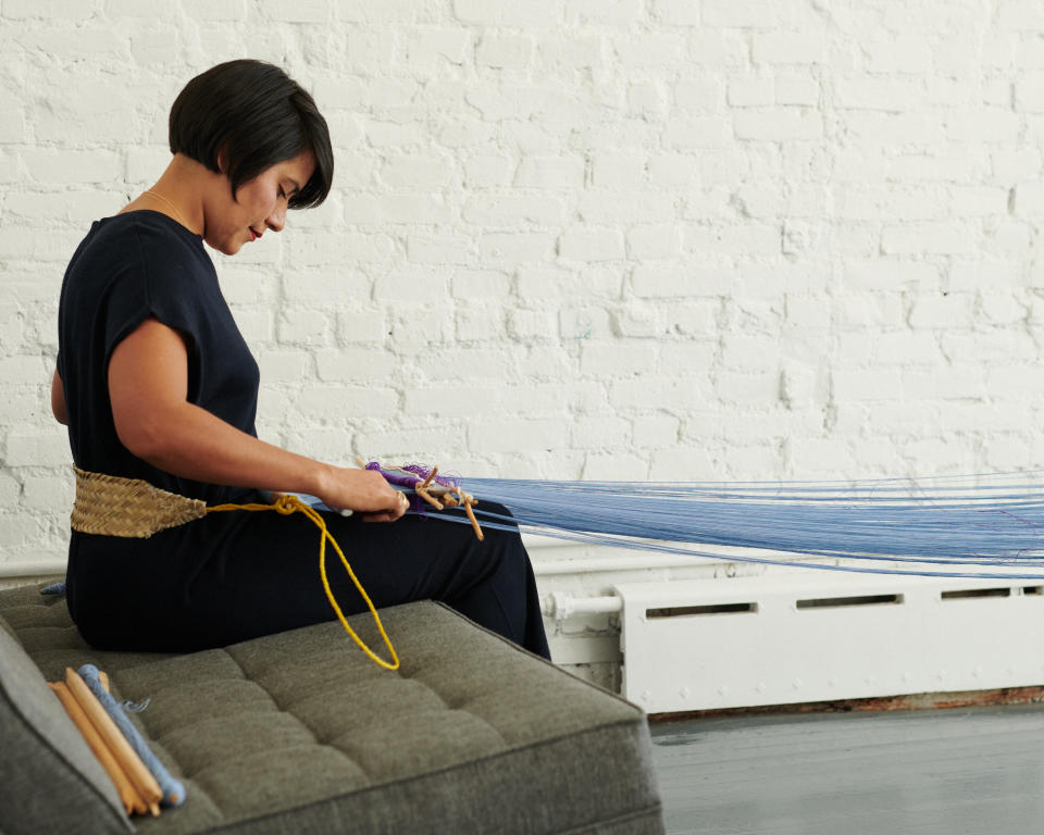 Paola Hernandez uses a backstrap loom in her Williamsburg, Brooklyn, studio.