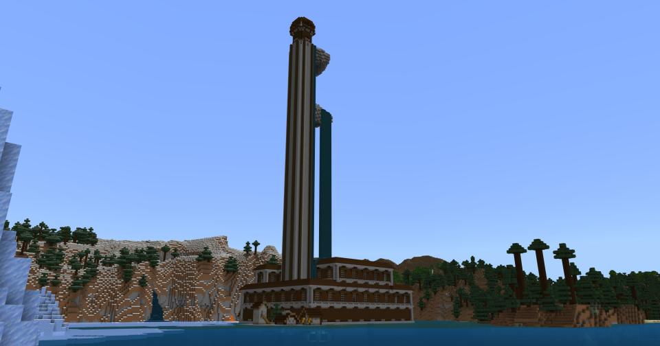 Minecraft seeds - A pillage outpost on a large tower on top of a mansion with a village and ocean monument below
