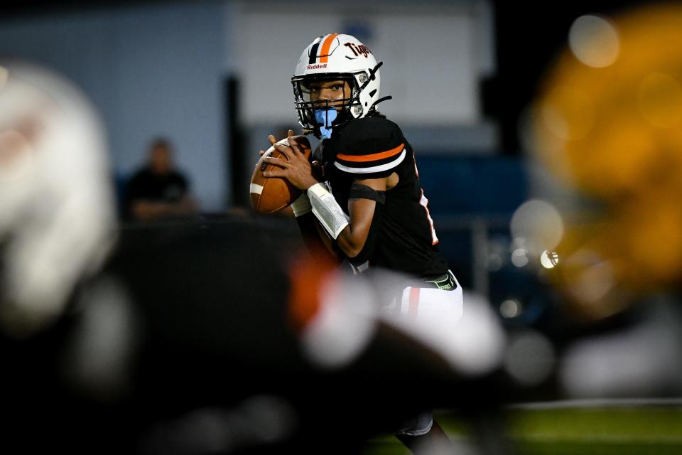 Beaver Falls quarterback Da'Sean Anderson looks to pass during Friday's game against Blackhawk at Reeves Field.