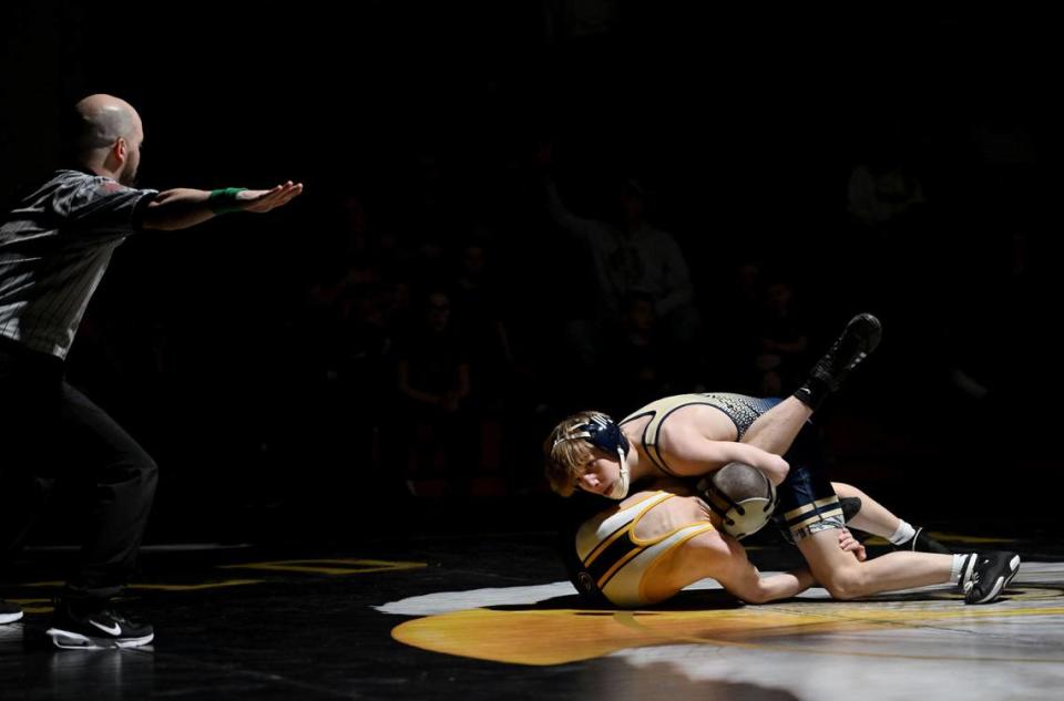 Bald Eagle Area’s Tanner Guenot controls Quaker Valley’s Bruce Anderchak in the 107 lb bout of the match on Monday, Feb. 5, 2024.