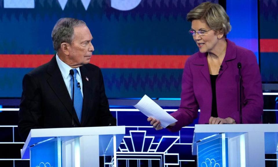 Mike Bloomberg talks with Senator Elizabeth Warren during a break at the ninth Democratic 2020 presidential debate in Las Vegas, Nevada.