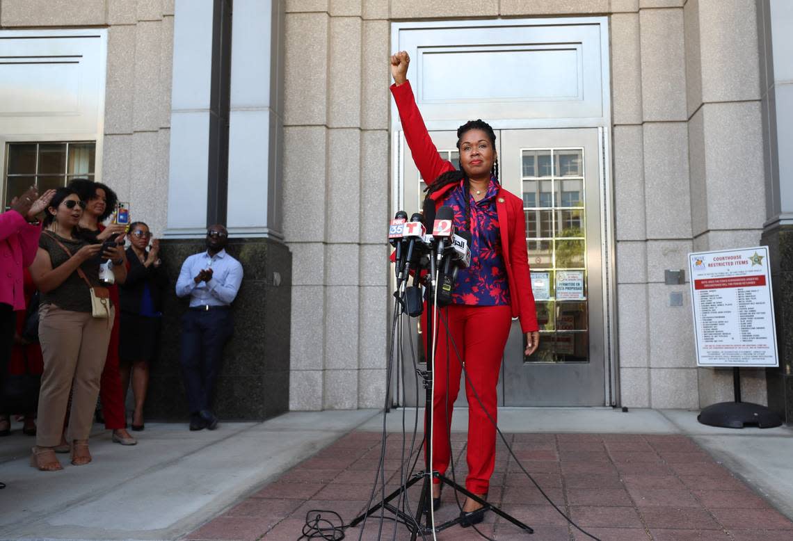 Monique Worrell ends her press conference with a raised fist outside her former office in the Orange County Courthouse complex, on Wednesday, August 9, 2023. Gov. Ron DeSantis on Tuesday announced the suspension of Orange-Osceola State Attorney Monique Worrell. At a press conference, DeSantis said Worrell and her office has been “clearly and constitutionally derelict” in her duty and said her policies justify her removal from office. Andrew A. Bain, a judge in Orange and Osceola counties, has been appointed by the governor. Ricardo Ramirez Buxeda/Orlando Sentinel