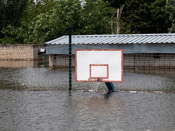 PHOTO: This general view shows a submerged basketball court in Kherson on June 8, 2023, after floodwaters engulfed the city following damage sustained at Kakhovka hydroelectric power plant dam. (Aleksey Filippov/AFP via Getty Images)