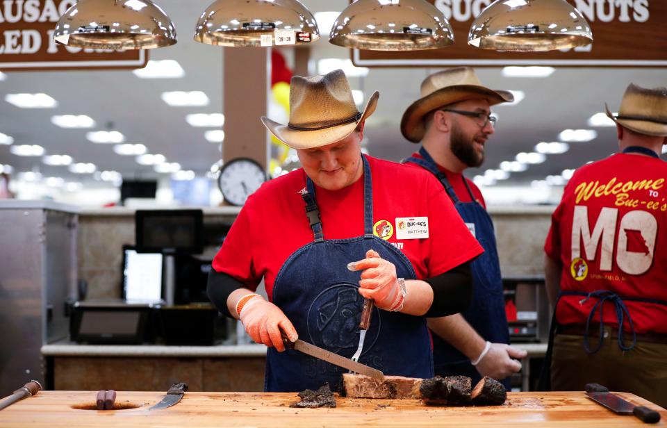 Buc-ee's brisket counter employee Matthew Barstead slices brisket at Missouri's first Buc-ee's on Monday, Dec. 11, 2023.