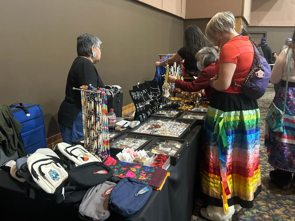 Judy Wabegijig of Silver Cedar Creations sells artisan crafts at the Sault Tribe of Chippewa Indians' Honoring Our Veterans Powwow to celebrate Veterans Day at Kewadin Casino on Nov. 11, 2023.