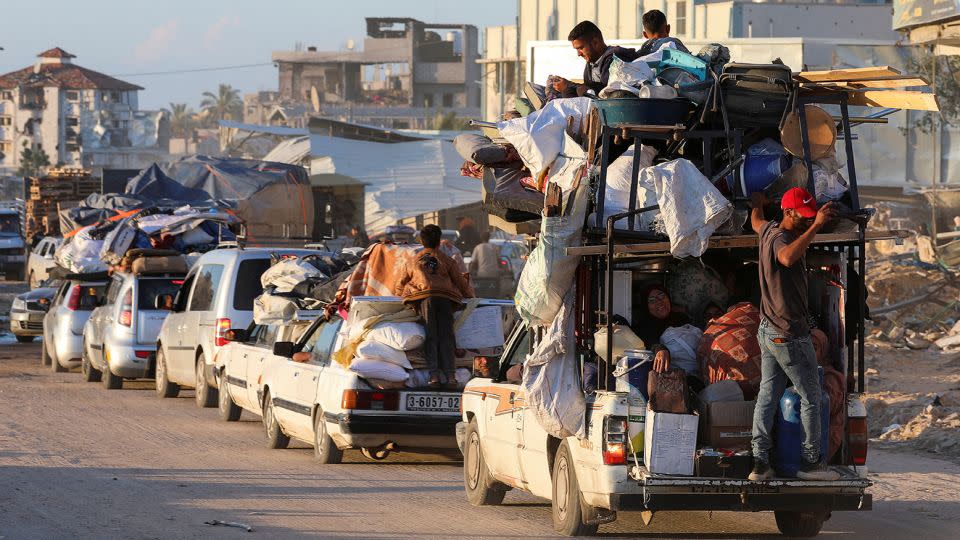 Displaced Palestinians fleeing Rafah after the Israeli military told civilians to leave the eastern parts of the southern Gazan city, May 6, 2024. - Ramadan Abed/Reuters