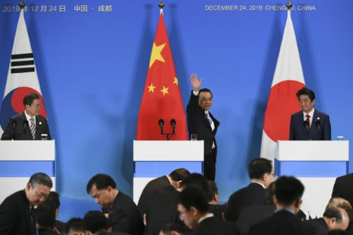 Chinese Premier Li Keqiang hosts the leaders of Japan and South Korea, with their nations focused on North Korea's nuclear ambitions