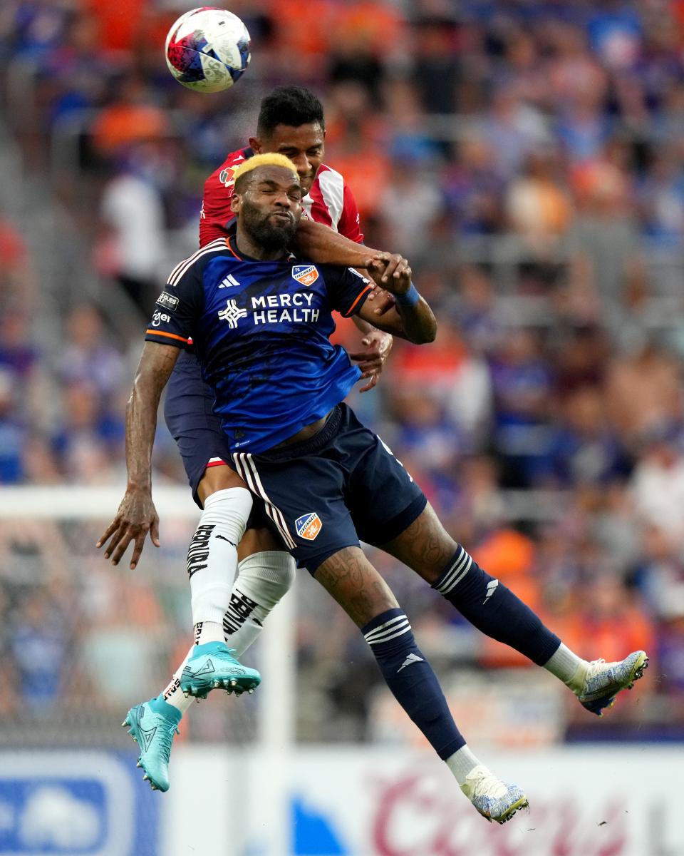 FC Cincinnati forward Aaron Boupendza (9) rises for a header in the first half of a Leagues Cup match, Thursday, July 27, 2023, at TQL Stadium in Cincinnati.