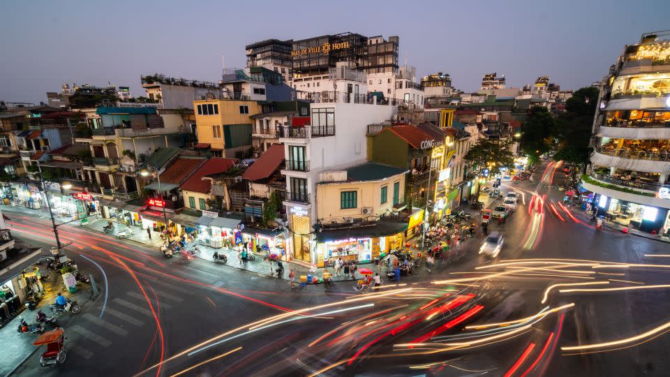 Traffic whizzes through Hanoi's old quarter - Didier Marti/Moment RF/Getty Images