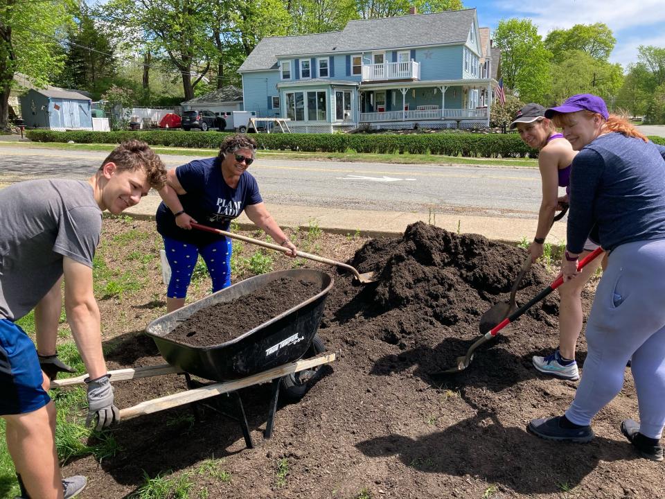 Justin Chipman, left, Denise Whitney, Linda Chipman and Susan Hubbard recently volunteered to help plant a community garden at St. Paul's Episcopal Church in Gardner.