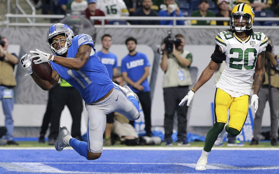 Detroit Lions wide receiver Marvin Jones (11), defended by Green Bay Packers cornerback Kevin King (20), catches an 8-yard pass for a touchdown during the first half of an NFL football game, Sunday, Oct. 7, 2018, in Detroit. (AP Photo/Rey Del Rio)