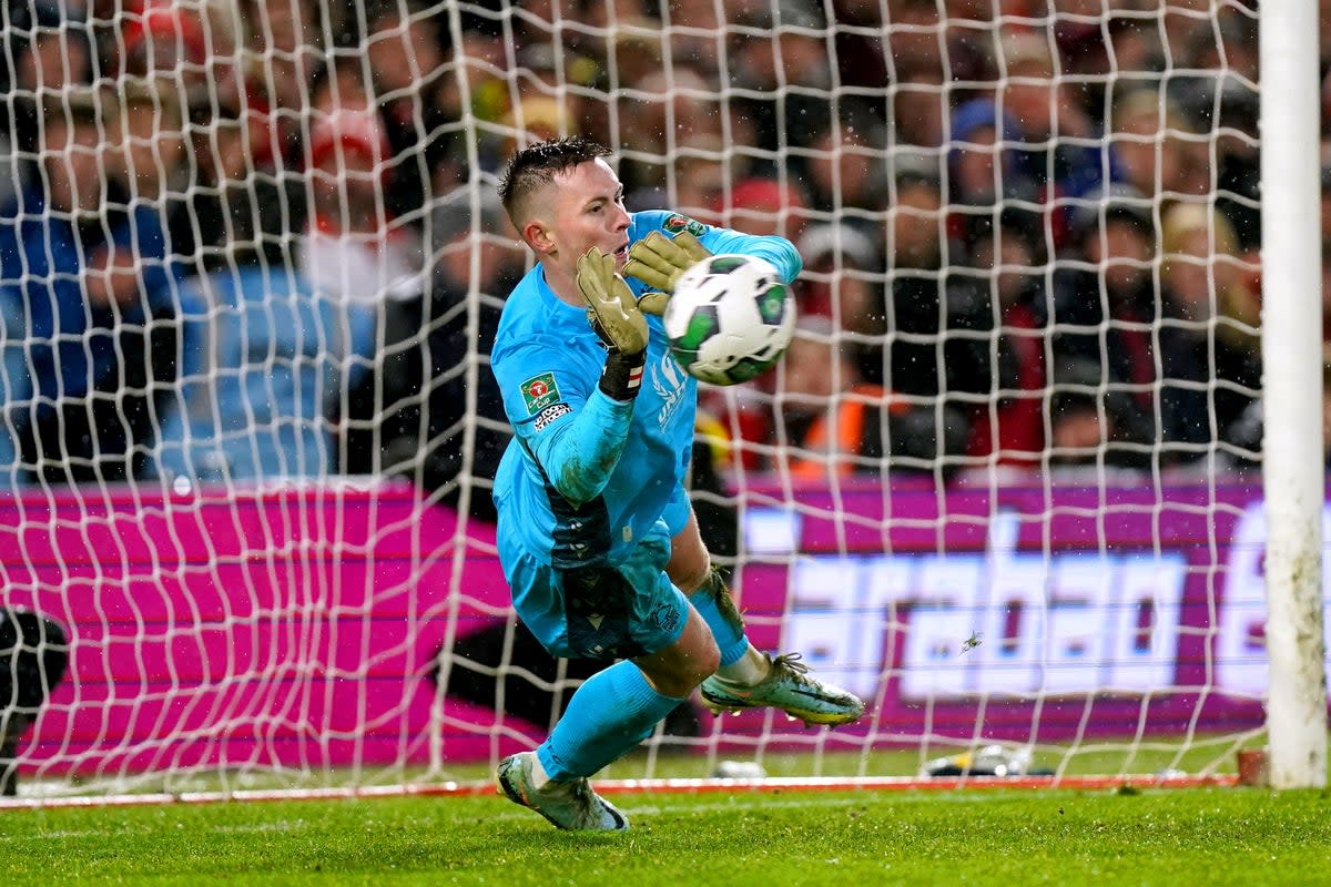 Dean Henderson saves from Wolves’ Joe Hodge in the penalty shoot-out to send Forest into the Carabao Cup semi-finals (Mike Egerton/PA) (PA Wire)