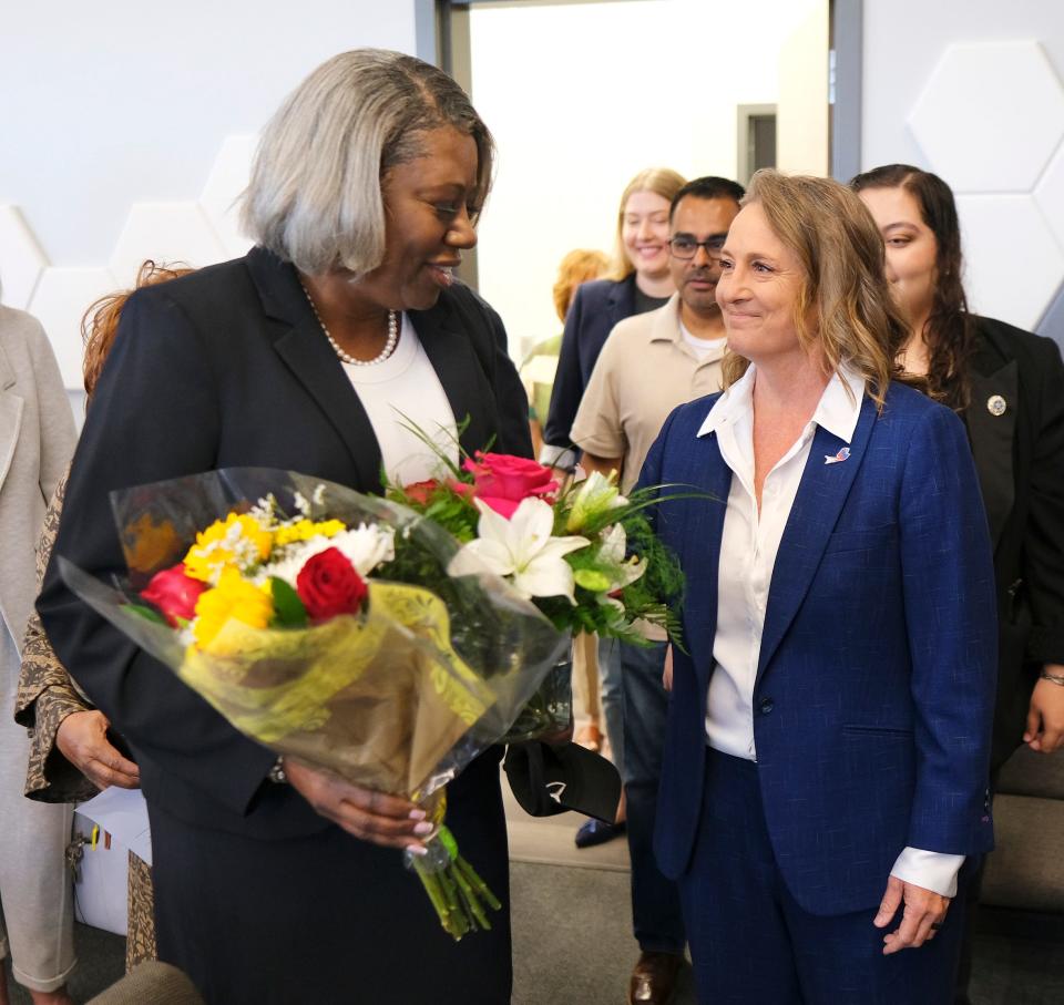 Oklahoma City School Board Chair Paula Lewis, at right, congratulates Jamie Polk after a May 11 meeting where Polk was chosen as the next superintendent for the school district. Polk will begin her new role on July 1.