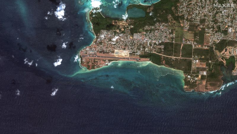 A satellite image shows an overview of an oil spill from a capsized barge off the shore of Tobago Island