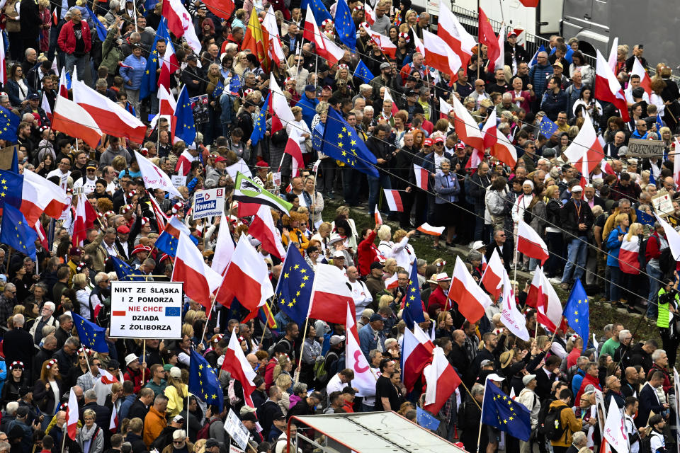 People attend a march to support the opposition against the governing populist Law and Justice party in Warsaw, Poland, Sunday, Oct. 1, 2023. Donald Tusk seeks to boost his election chances for the parliament elections on Oct. 15, 2023, leading the rally in the Polish capital. (AP Photo/Rafal Oleksiewicz)