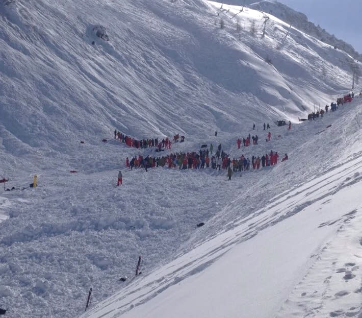 In this image made available by Victor Diwisch rescue personnel work at the site of an avalanche at Lavachet Wall in Tignes, France, Monday Feb. 13, 2017. French rescue workers say a number of skiers have been killed in an avalanche in the French Alps near the resort of Tignes. It occurred in an area popular among international skiers for its extensive slopes and stunning views, but no information was immediately available about the skiers' nationalities. (Victor Diwisch via AP)