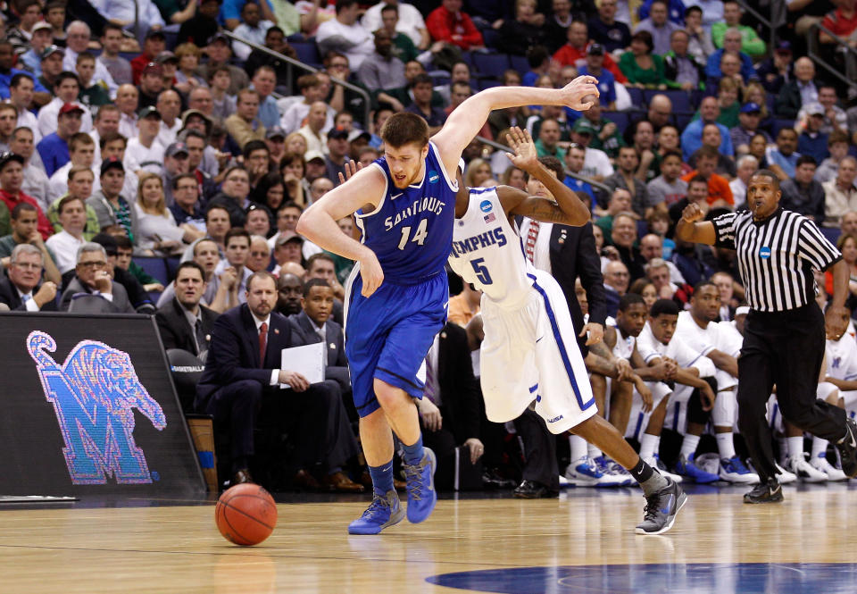 COLUMBUS, OH - MARCH 16: Brian Conklin #14 of the Saint Louis Billikensa nd Will Barton #5 of the Memphis Tigers go for a loose ball late in the second half during the second round of the 2012 NCAA Men's Basketball Tournament at Nationwide Arena on March 16, 2012 in Columbus, Ohio. (Photo by Rob Carr/Getty Images)