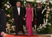 <p>The First Lady made a statement dressed in hot pink Dior at the annual Red Cross Ball at Mar-a-Lago.</p>