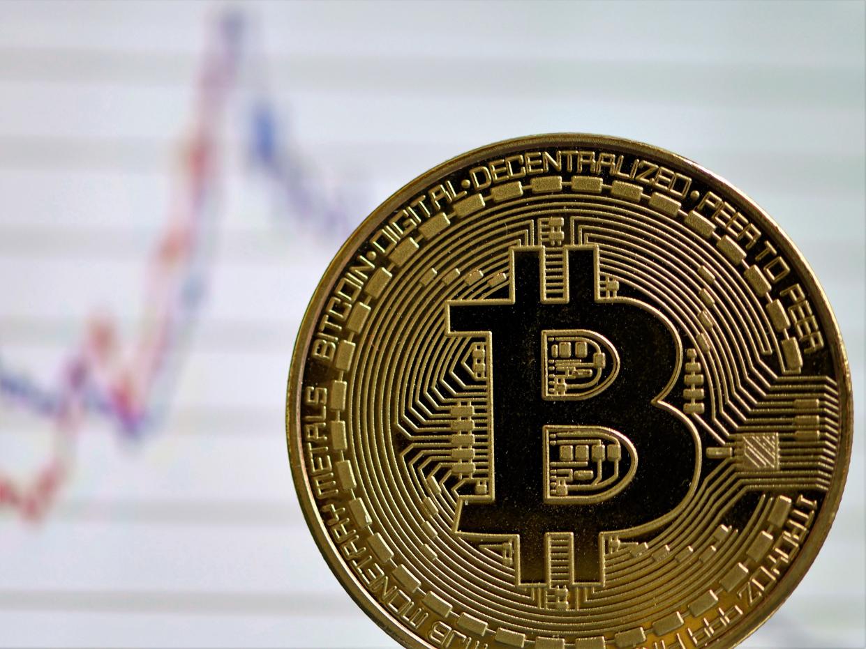 Bitcoin has crashed in price by more than a third since April 2021 (AFP via Getty Images)