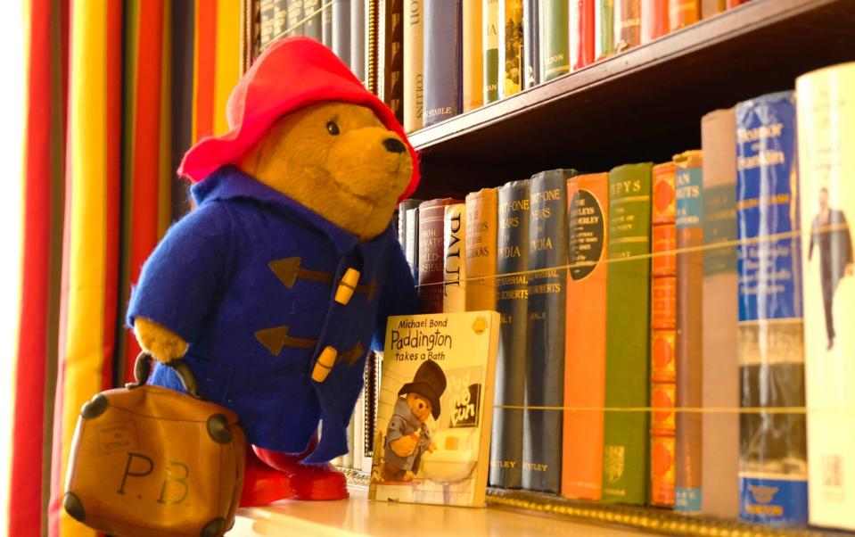 Paddington Bear indulging in 'some light reading' at Clarence House - PA
