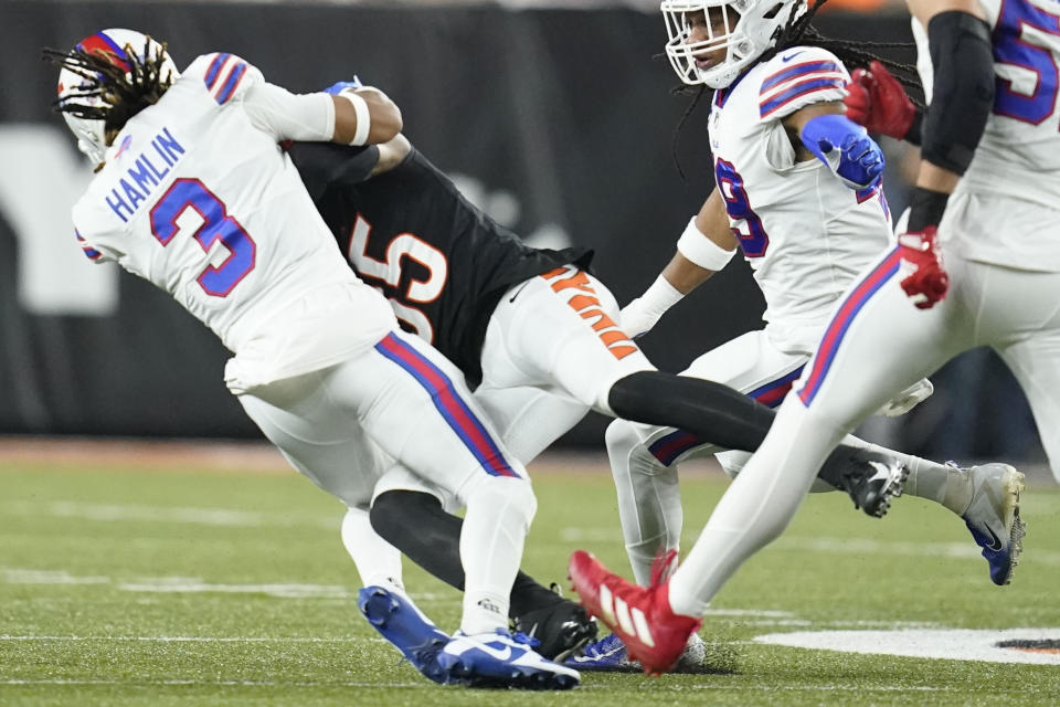 Cincinnati Bengals wide receiver Tee Higgins (85) collides with Buffalo Bills safety Damar Hamlin (3) during the first half of an NFL football game, Monday, Jan. 2, 2023, in Cincinnati. Hamlin was injured on the play. Tonight's Buffalo Bills-Cincinnati Bengals game has been postponed after Buffalo Bills' Damar Hamlin collapsed, NFL Commissioner Roger Goodell announced. (AP Photo/Joshua A. Bickel)