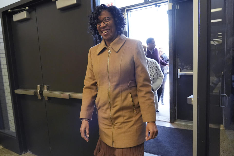 Chicago Treasurer Melissa Conyears-Ervin, who runs for Congress in IL-07, smiles as she walks into Marshall Metro high school to vote in Chicago, Tuesday, March 19, 2024. Illinois residents will vote Tuesday to narrow Democratic and GOP candidate fields in key U.S. House races. (AP Photo/Nam Y. Huh)