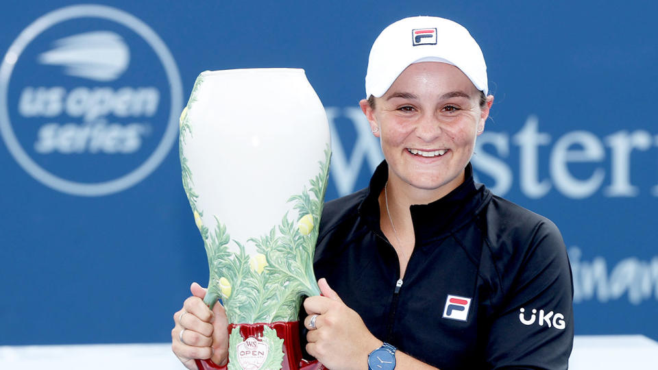 Seen here, Ash Barty poses with Western & Southern Open trophy.