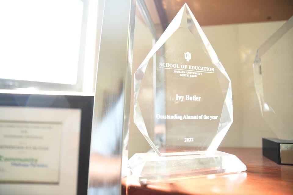 Ivy Butler's awards sit on a shelf in her office recently at Power in Praise Crusade Ministries in Mishawaka.