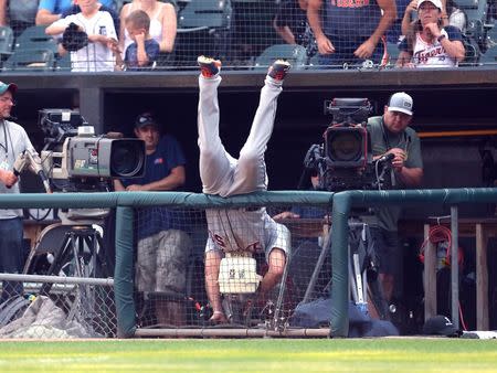 Jun 16, 2018; Chicago, IL, USA; Detroit Tigers first baseman John Hicks (55) falls into the photo pit during the ninth inning against the Chicago White Sox at Guaranteed Rate Field. Mandatory Credit: Dennis Wierzbicki-USA TODAY Sports