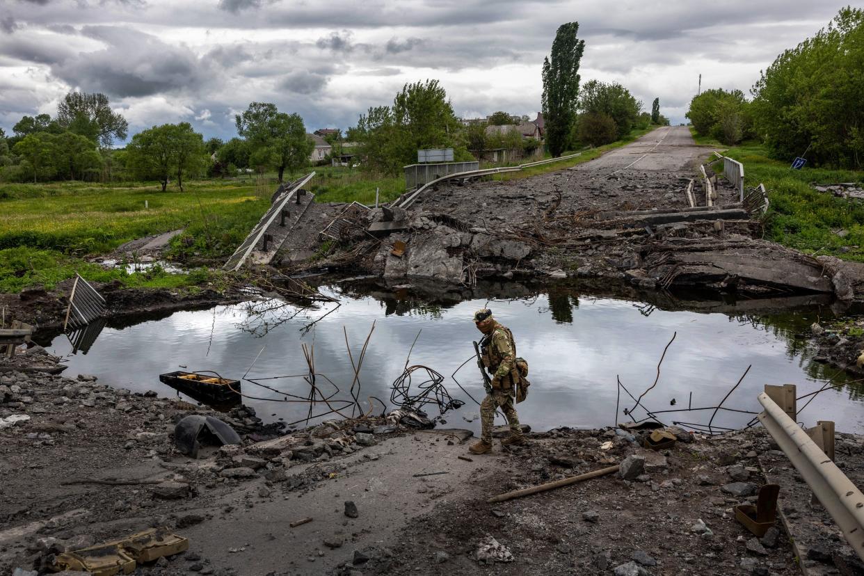 Ukrainian Territorial Defense soldiers patrol near the frontline on May 22, 2022 near Ruski Tyshky, Ukraine. 