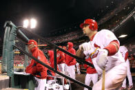 ST LOUIS, MO - OCTOBER 19: Albert Pujols #5 of the St. Louis Cardinals looks on from the dugout during Game One of the MLB World Series against the Texas Rangers at Busch Stadium on October 19, 2011 in St Louis, Missouri. (Photo by Dilip Vishwanat/Getty Images)